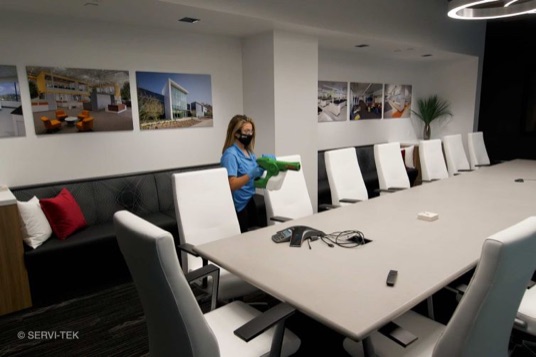 Janitor cleaning the office